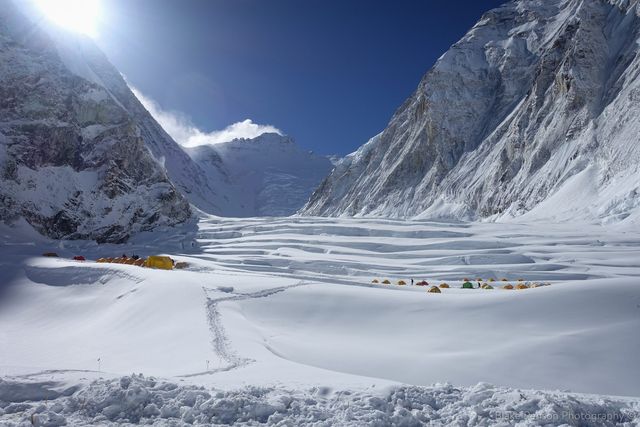 Camp One with the crevassed filled glacier of the Western CWM and the Lhotse face in the background