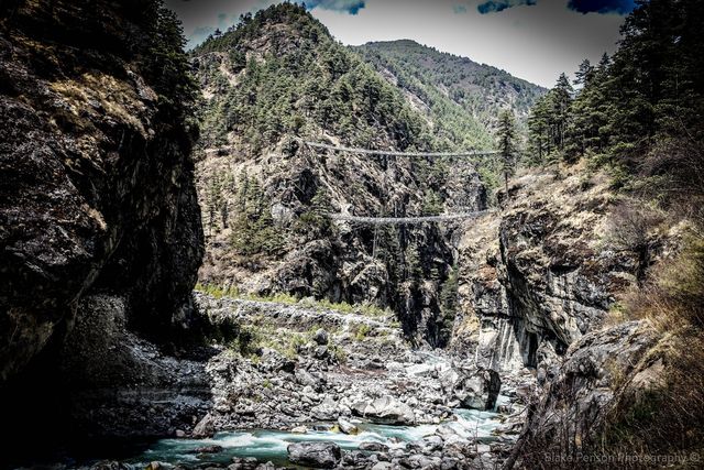 The suspension bridge we crossed. The older now unsed bridge still below