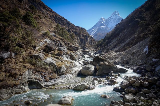 Crossing the increasingly turbulent Imja Khola river