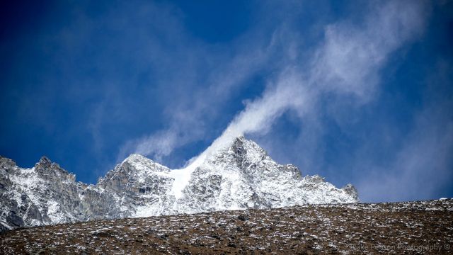 Winds ripping on a nearby peak