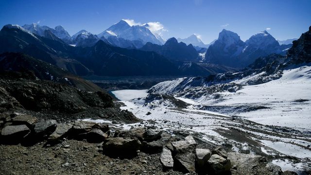 Views from the Renjo La Pass down towards Gokyo with Everest and Lhotse in the background