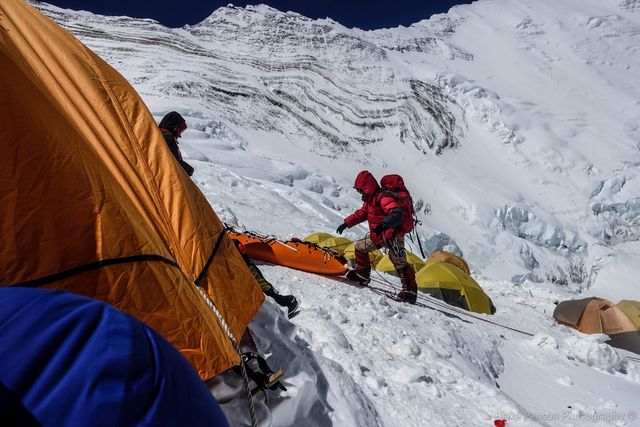 Another body being lowered past our tent.