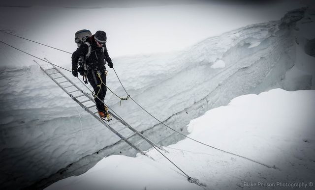Rory crossing a crevasse